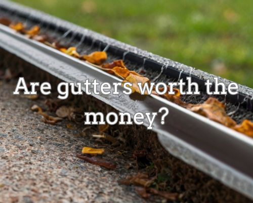 A pile of leaves and debris clogging a neglected gutter, causing water to overflow and damage the surrounding area