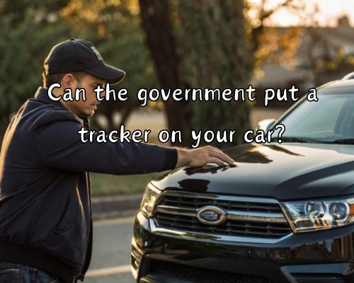a government employee installing tracker on a vehicle
