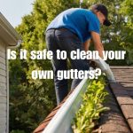 homeowner cleaning his roof gutter