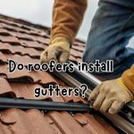 a roofer working on gutter