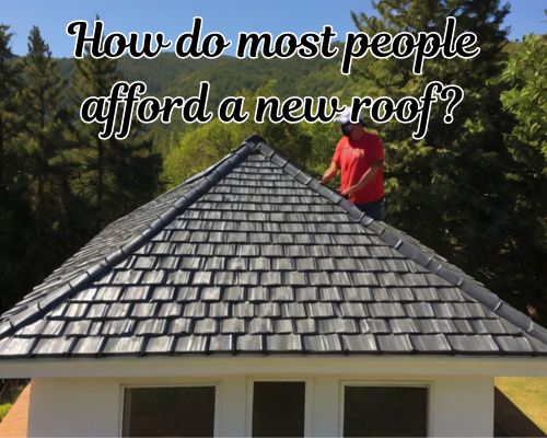 Roofer applying paint to the roof.