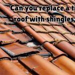 Water stains below missing tiles.