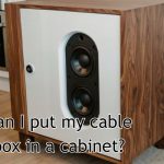cable box in a cabinet